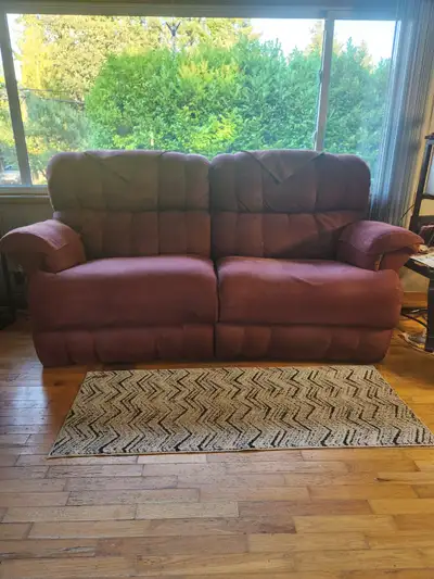 Nice freshly shampooed microfiber sofa/recliner. Has recliners at both ends. I've always had a cover...