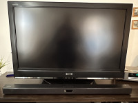 Télévision Bravia Sony HD 42 po avec barre de son et caisson.