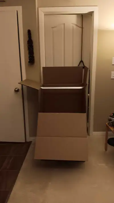 Pick up in Applewood 16th Ave and 68th St SE Two Shorty Wardrobe Moving Boxes with Bars H 39" W 23"...