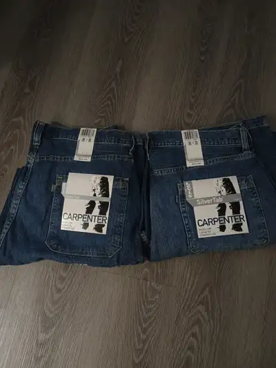 2 Pairs brand new Levi's Silver Tab Carpenter pants. Old school 90's style, rare, new was $54 each,...