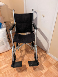 Fauteuil roulant presque neuf