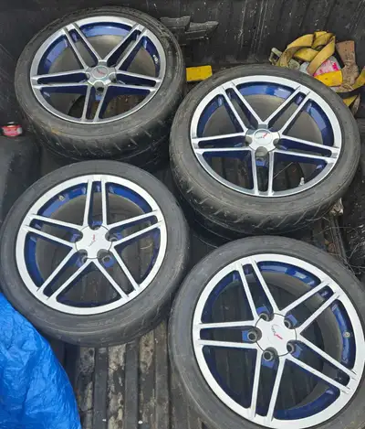 Chrome alloy rims with blue accents look absolutely gorgeous but need the space and extra cash