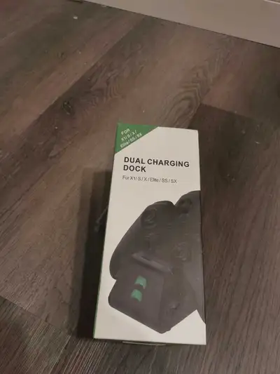 Brand new Xbox wireless charging dock. Comes with two wireless charge batteries, back battery covers...