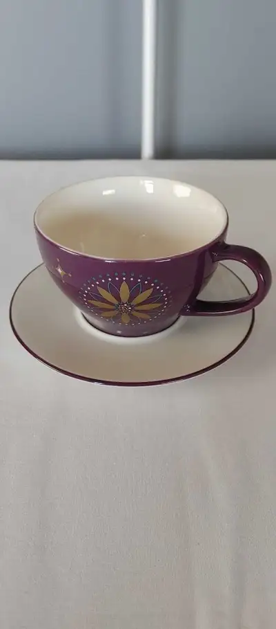 Collectible Starbucks Purple coffee mug and saucer. In new like condition, never used, no chips, cra...