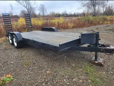 2015 American Flatdeck, 18ft, ramps, 2x 5k axles, 8k load capacity.
