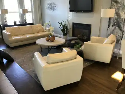 LEATHER SOFA AND TWO CHAIRS, View more