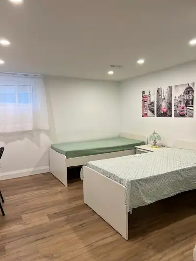 A shared bedroom in a spacious, bright, clean and well-organized basement. $520/month. Ideal for stu...