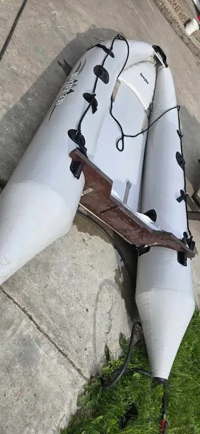 Sevylor svx330 zodiac. Rated for 8hp. Great shape asking $600. Located in hinton