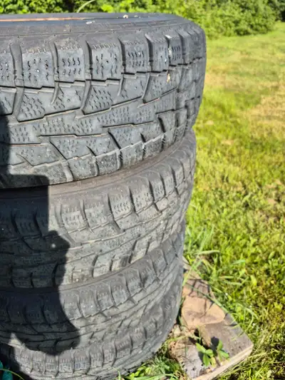 245 75 R17 Blackhawk winters with real good tread on 8x180 steel rims