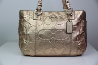 coach gold embossed tote