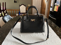 MK medium cross body leather purse