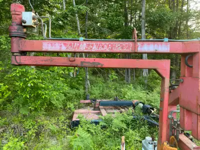 Older bale wrapper can be seen working used last year