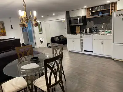 Recently renovated self-contained tastefully Furnished and Equipped lower level 1 bedroom + Den apar...