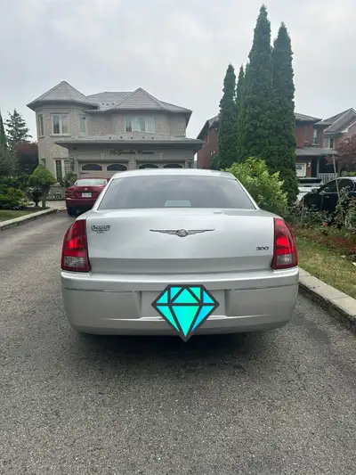 For sale is a Chrysler 300, a sleek and stylish sedan that offers a comfortable ride and distinctive...