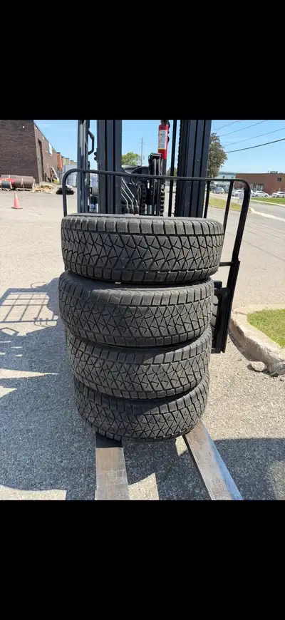 Came off a Honda Odyssey. Set of 4 Bridgestone Blizzak DM-V2 winter tires on steel rims. Size 245/65...