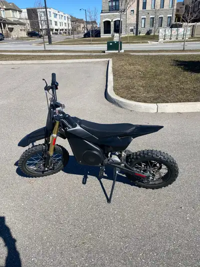 Electric dirt bike is 1 year old in very good condition. Medium size (front wheel 14 inch-rear wheel...