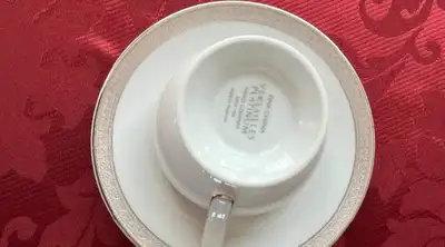 Versailles Platinum Fine China With Silver Trim, like new. One set includes 6 pieces. 1 tea cup 1 sa...