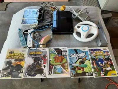 Nintendo Wii bundle w/ 6 games, View more
