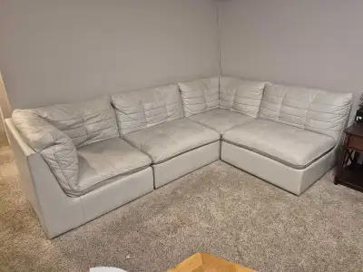 Rearrangeable for different configurations. Faux leather, could use a bit of a wash. As is, pickup o...