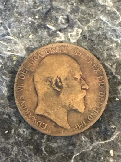 Here's a piece of history you can hold in your hand: a 1904 One Penny coin featuring King Edward. Th...