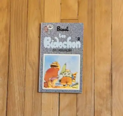 2 livres: BD: $1. chacune. LES BIDOCHON 2: EN VACANCES. NELSON., View more