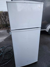 White whirlpool fridge for sale 200.00. Delivery available 