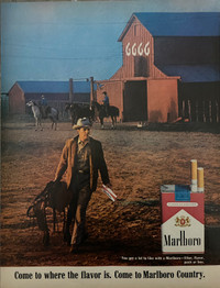 1966 Marlboro Cigarettes w/Cowboy Holding Saddle Original Ad