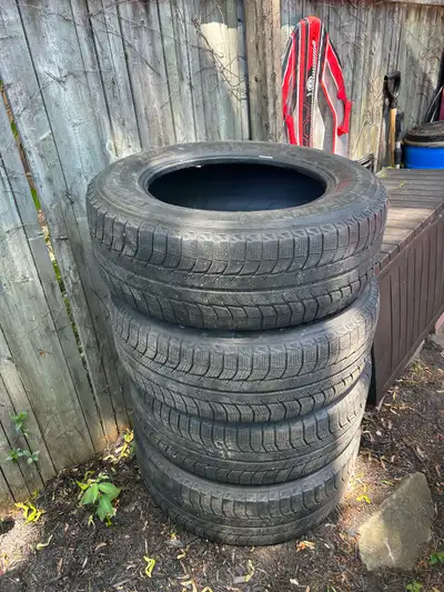 Full set of Michelin winter tires in great shape lots of tread left 235/65/r17. $150 for full set. P...