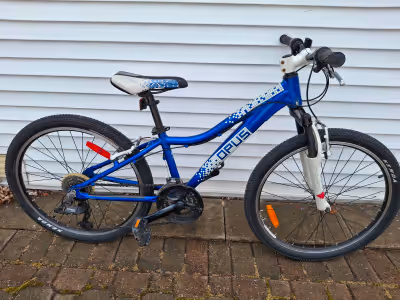 24" Opus Recon youth bike. There is normal wear and tear marks on it, but excellent working conditio...