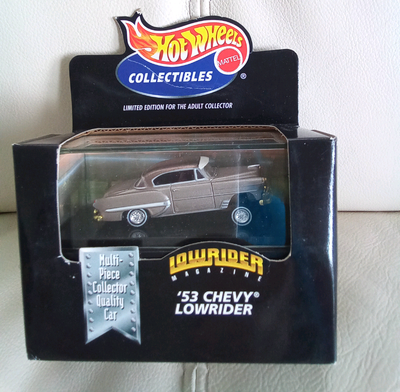 1998 RELEASE CAR IN MINT CONDITION BOX MAY HAVE STORAGE WARE NOT TORN OR DAMAGED LOWRIDER SERIES DIE...
