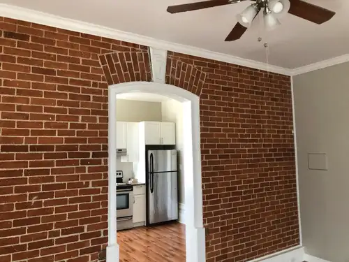 In the heart of downtown Brighton, this main floor apartment is a rare find. Exposed brick wall livi...