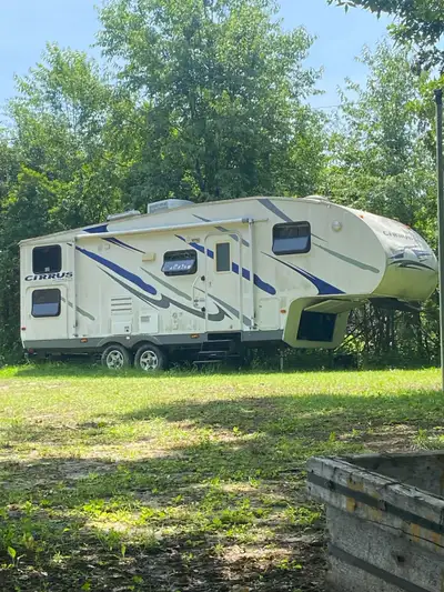 Fully loaded Needs some work Comes with 5th wheel hitch 613-572-4233