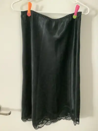 Ladies S-M slips Black in colour One short full, one half mid-calf, both in perfect condition Asking...