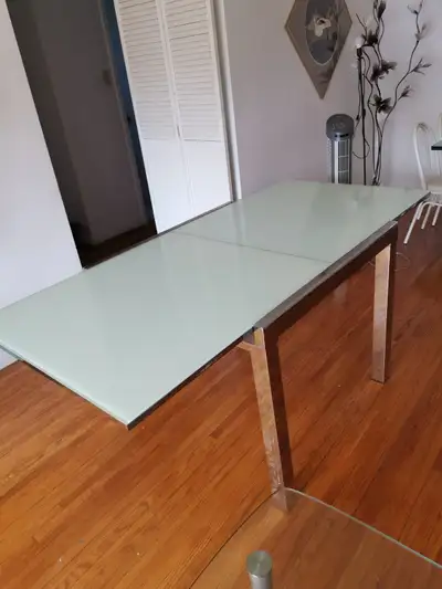 Extendable glass dining table $280, bought 2 years $840, like ne, View more
