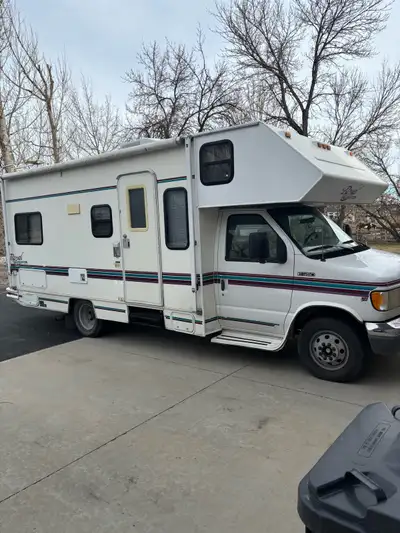 24 ft motorhome 99,127kms Just had the over head bunk redone, fuel system and exhaust were done last...