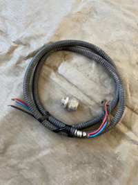 9 feet of 8/3 armoured wire and 1 inch connector
