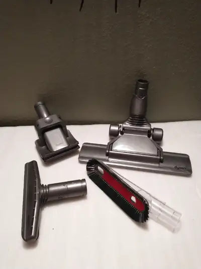 Selling assorted brand new Dyson vacuum attachments. Pet grooming, flat out head tool, ceiling fans...