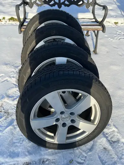 A set of 4 winter tires on alloy rims.they are 215 55R17 94 V made in June 2022. Asking for $800 Sol...