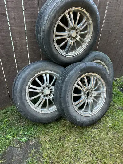 Stock rims and tires 2010 Toyata Rav 4 Rims in good shape. Tires have 50% wear left.