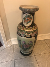 Vintage Chinese 26 “ vase with wooden stand.