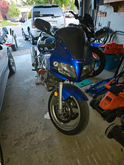 2004 suzuki SV650 blue in color. Bike starts and runs. Heated grips. Sport touring style Bike. One s...