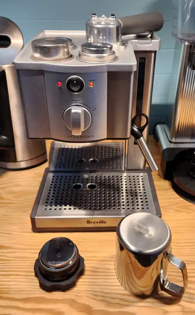 Up for sale is a great espresso machine along with some accessories such as a fancy tamper and froth...