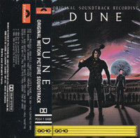 Dune items: soundtrack on cassette tape, magazines, comic