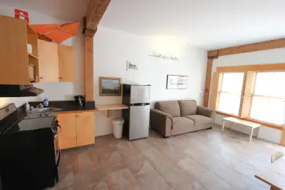 This spacious 2 floor - 1 bedroom loft with lovely courtyard and private deck is located just above...