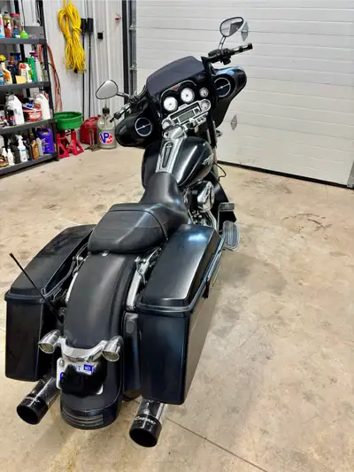 2010 Street Glide. 30,000 miles. Engine upgrade from 96 to 110 cube. New tires in 2024. Colour is fl...