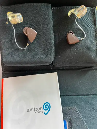 Hearing aid Unitron with guide and warranty. Paid $2,700. Asking $1,500