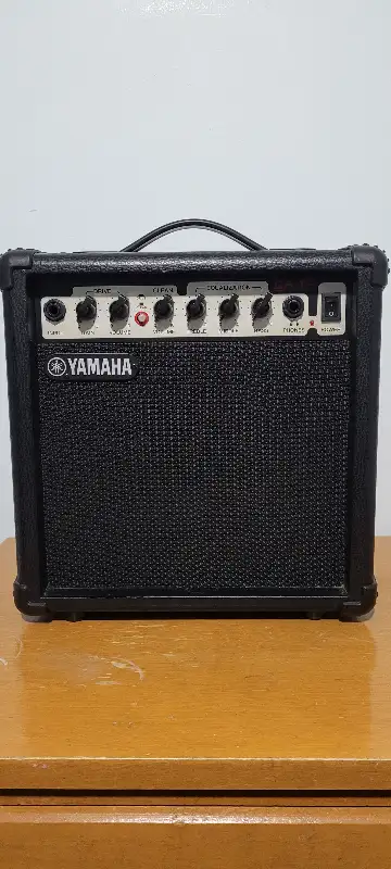 Yamaha Guitar Amplifier Model GA-15 with 20 ft. male to male amp cable. $60 CASH ONLY