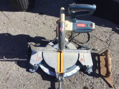 Ryobi 12” ,15 amp. Mitre saw. Works well. No dust bag.