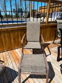 One reclining deck chair with foot stool.