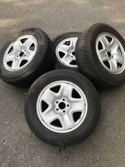 I am selling Mazda CX-5 four 225/65R17 Continental (Viking Contact7) winter tires on MAZDA factory r...